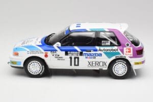 Mazda 323 GTX #10 T. Makinen / S. Harjanne 1000 Lakes Rally 1991 Otto 1:18 OT1099 Żywica — zdjęcie 3 z 6
