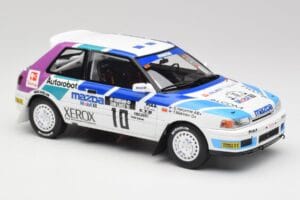Mazda 323 GTX #10 T. Makinen / S. Harjanne 1000 Lakes Rally 1991 Otto 1:18 OT1099 Żywica — zdjęcie 4 z 6
