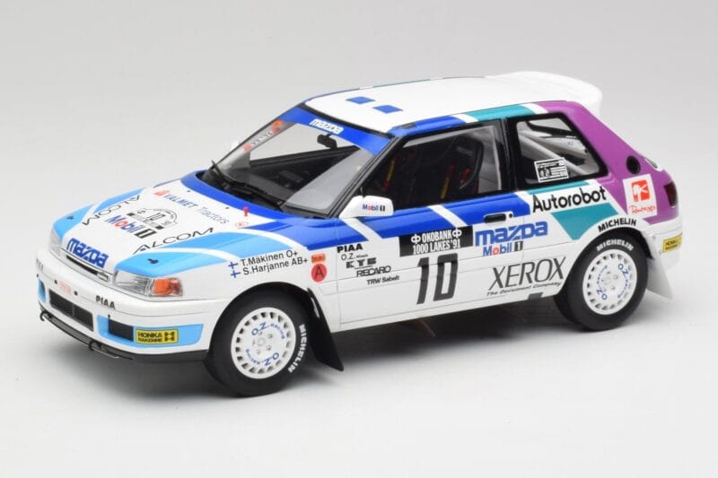 Mazda 323 GTX #10 T. Makinen / S. Harjanne 1000 Lakes Rally 1991 Otto 1:18 OT1099 Żywica
