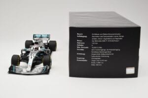 Mercedes AMG Petronas W10 #44 L. Hamilton F1 World Champion Dealer Edition 2019 Minichamps 1:18 B66960567 Metal — zdjęcie 6 z 7