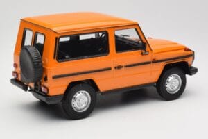 Mercedes G-Class W460 SWB Pomarańczowy Minichamps 1:18 155038000 Metal — zdjęcie 2 z 6
