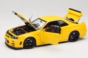 Nissan Skyline GT-R R34 Customized Version Żółty MotorHelix 1:18 M83412 Metal — zdjęcie 2 z 8